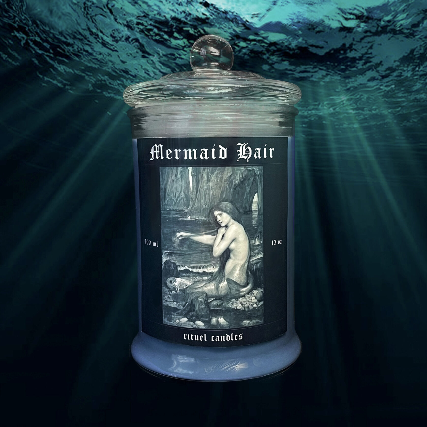 синяя свеча с русалкой и морским ароматом