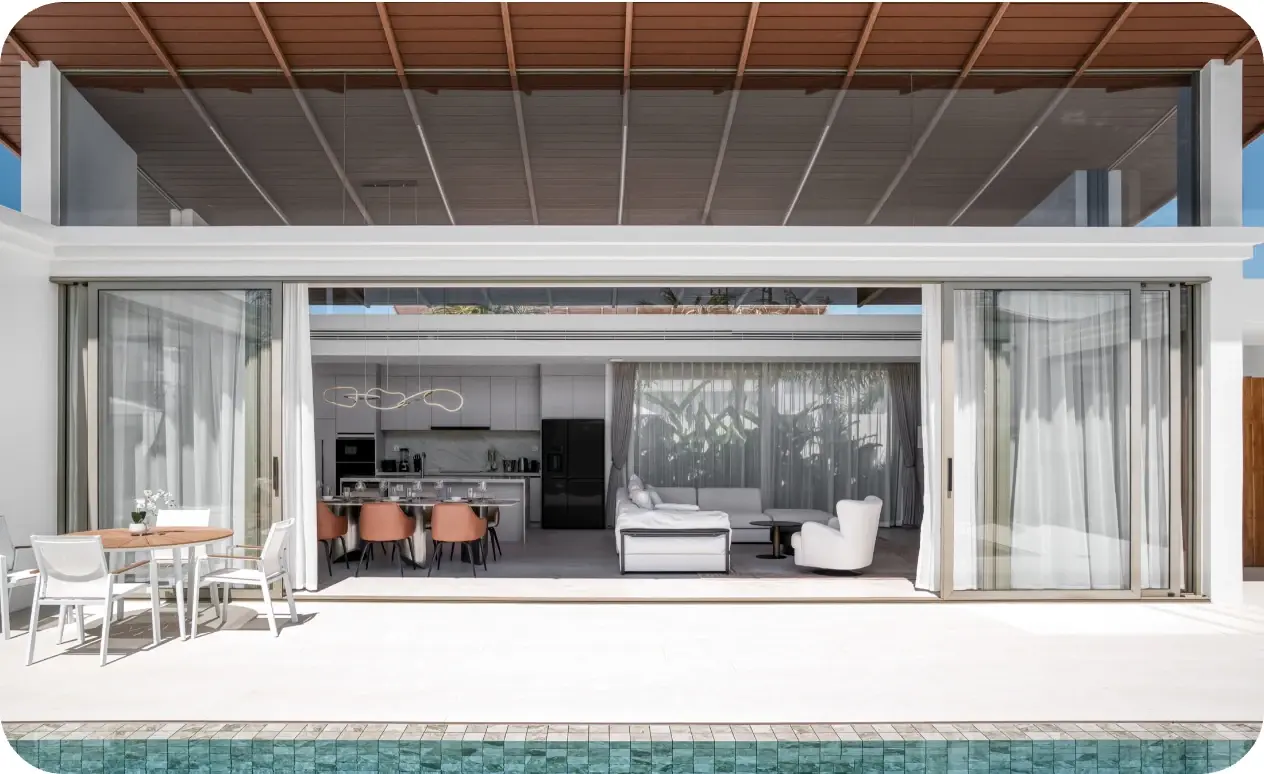 View from the pool towards the open-plan kitchen and living area