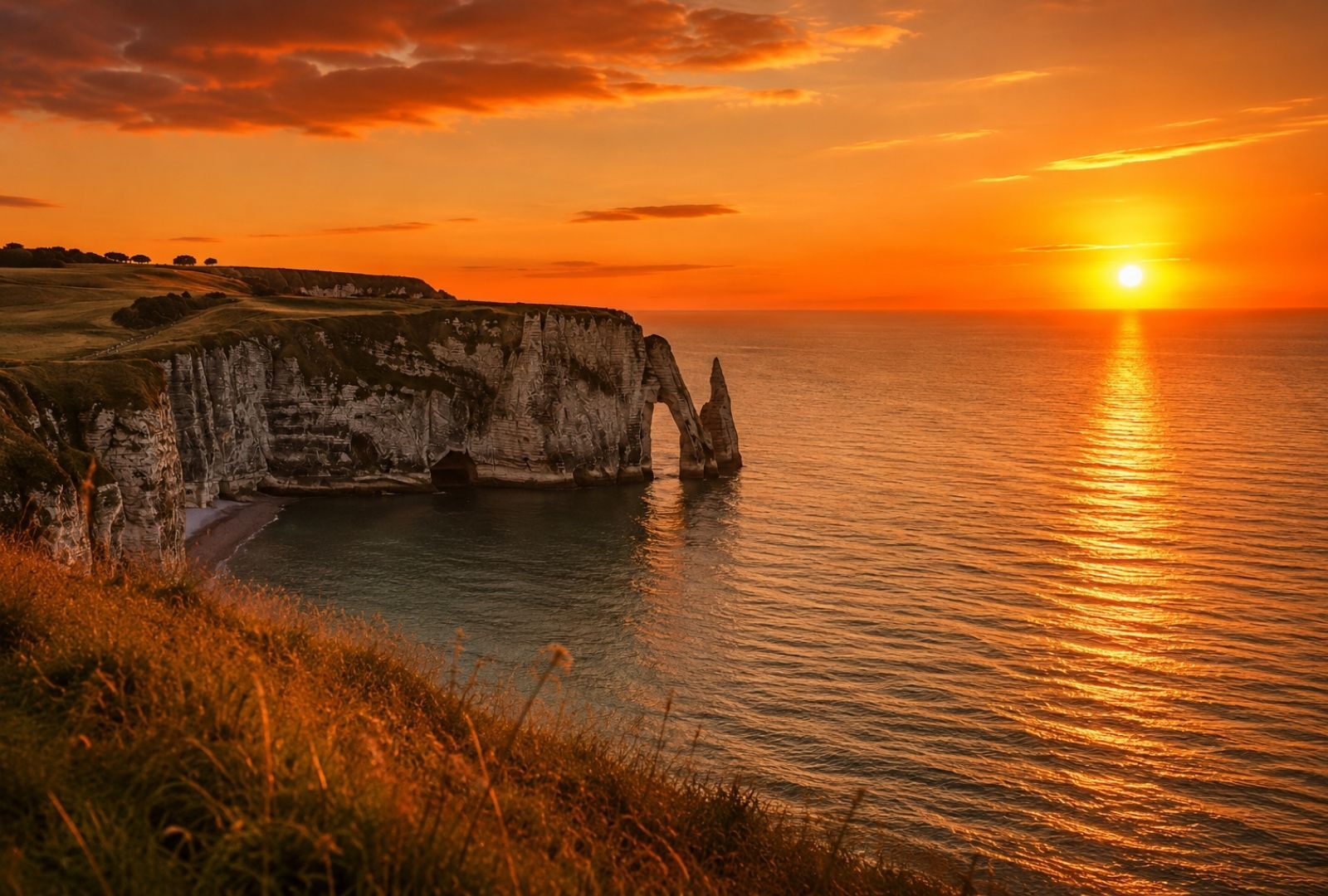 Normandy cliffs at sunset over the sea