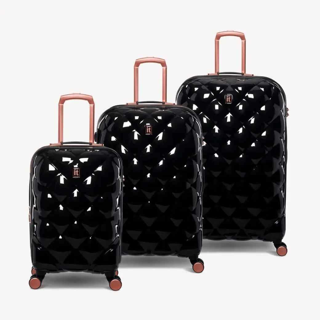 Коллекция чемоданов St Tropez it luggage черного цвета из поликарбоната, замок TSA, увеличение объема, колеса 360°