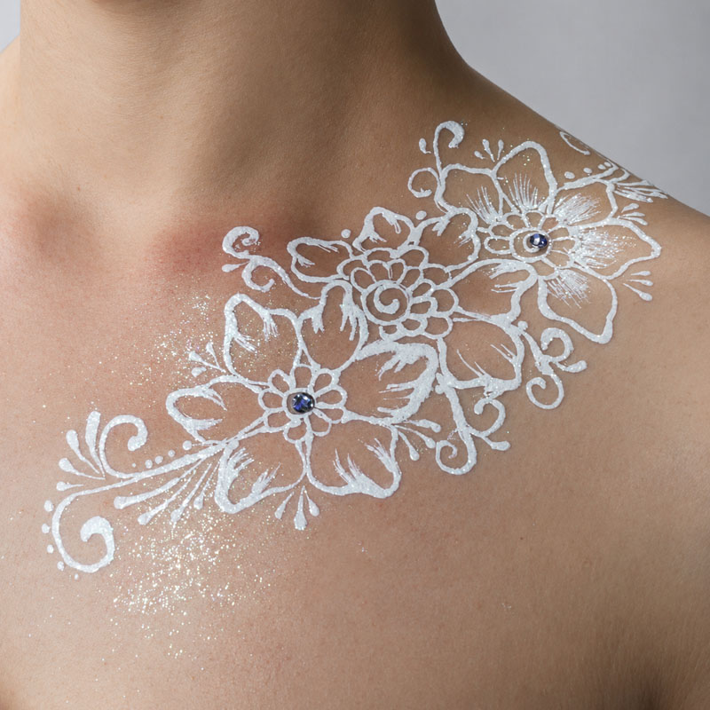 Intricate henna design on hand