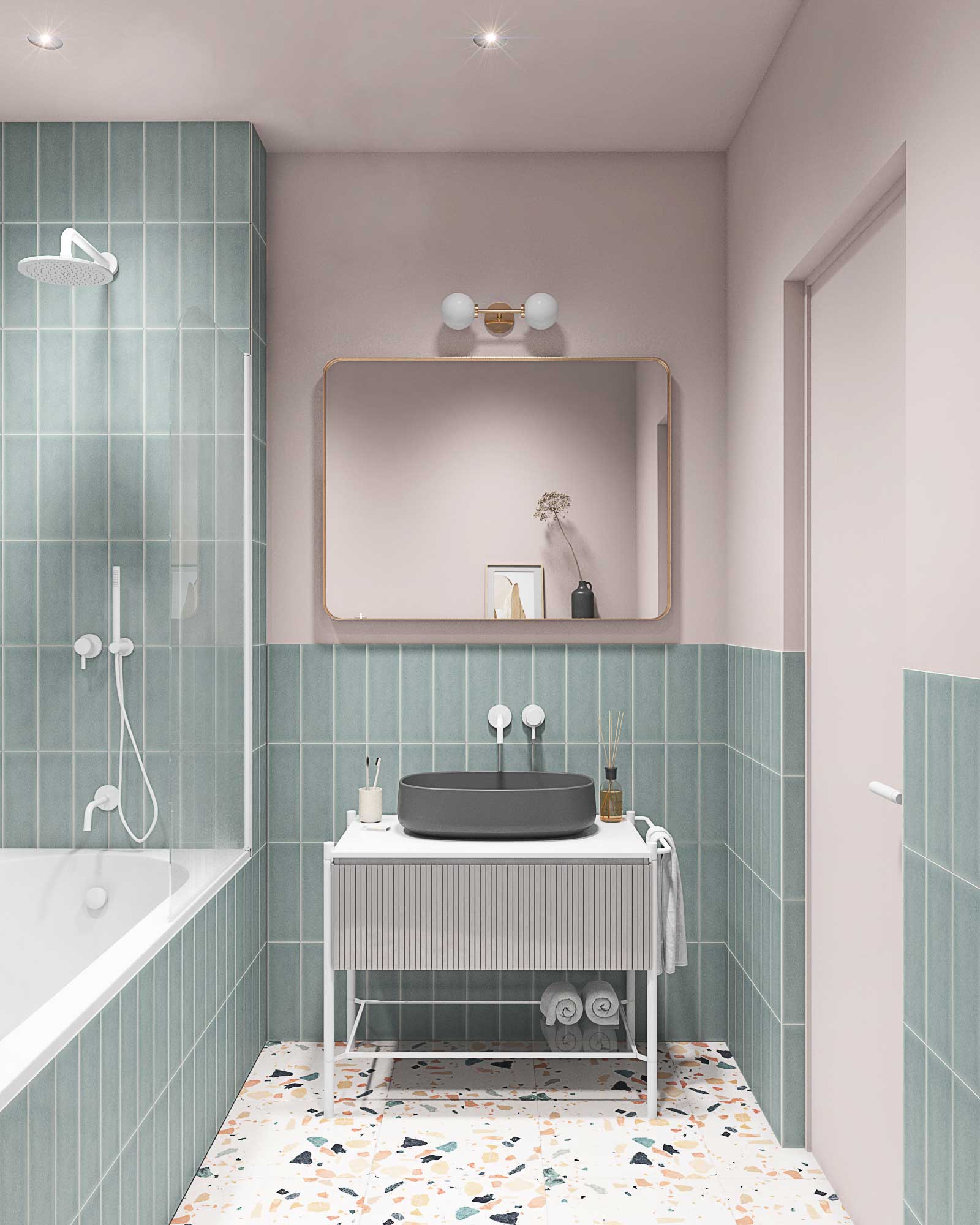 Ванная с голубой плиткой на стене, терраццо на полу. Приставной унитаз сТумба под накладную раковину. Серая раковина со встроенными смесителем из стены белого цвета. Зеркало с золотой рамой. Розовые стены в ванной комнате.